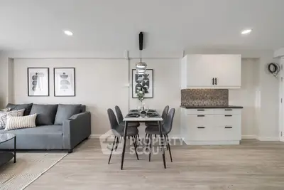 Modern living room with stylish dining area and contemporary decor