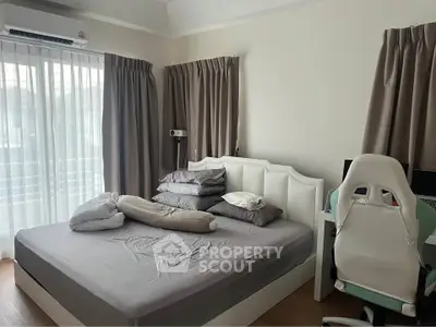Cozy bedroom with modern decor and natural light
