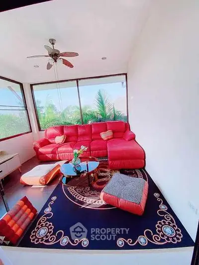 Stylish living room with red sectional sofa and modern decor