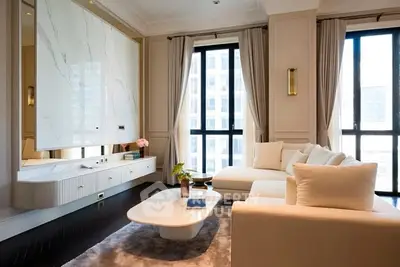 Luxurious modern living room with elegant decor and large windows offering city views.