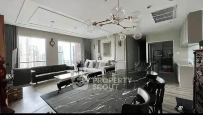 Luxurious open-plan living and dining area with city view, modern decor, and elegant lighting.