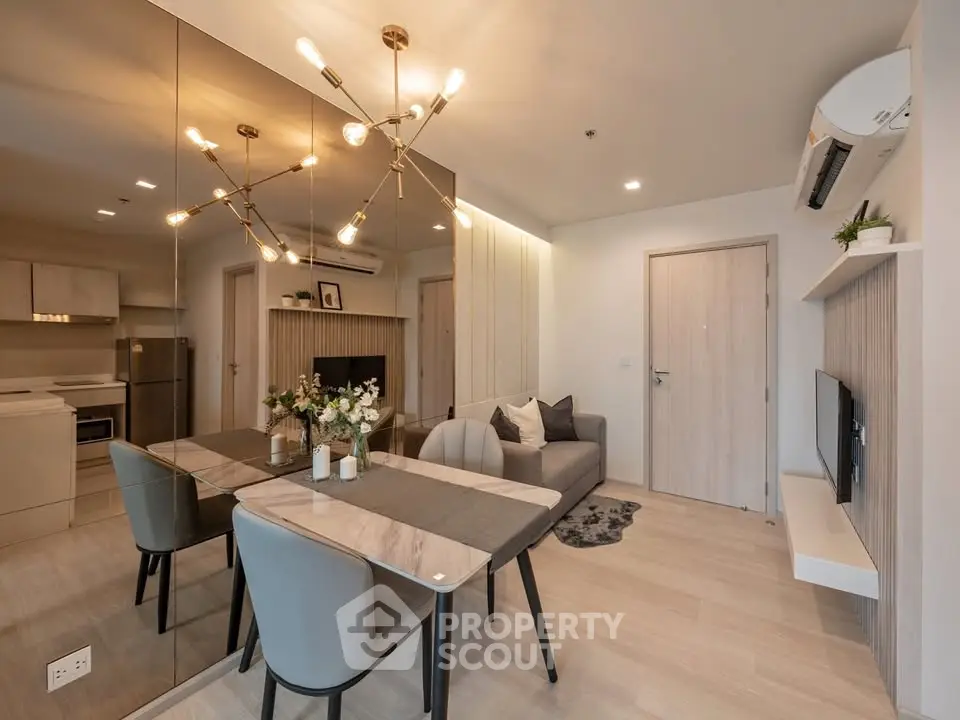 Modern living room with stylish decor, open layout, and elegant lighting in a contemporary apartment.
