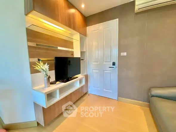 Modern living room with sleek TV unit and stylish decor