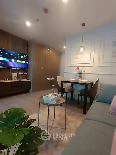 Modern living room with stylish decor and cozy dining area