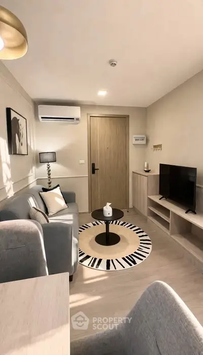Modern living room with stylish decor and cozy seating area