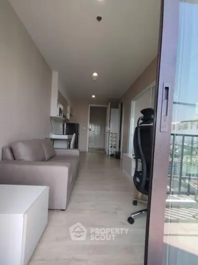 Modern apartment interior with sleek design and balcony view