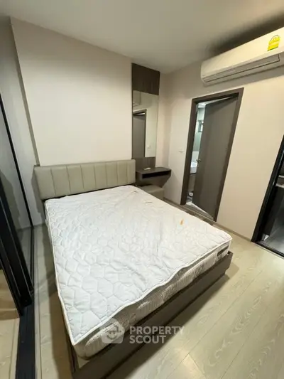 Modern bedroom with air conditioning and stylish decor in a cozy apartment