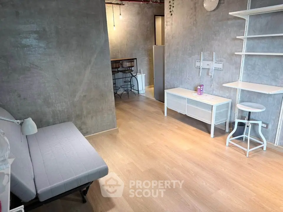 Modern minimalist living room with stylish furniture and open layout, perfect for urban living.