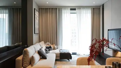 Luxurious modern living room with elegant decor and natural light