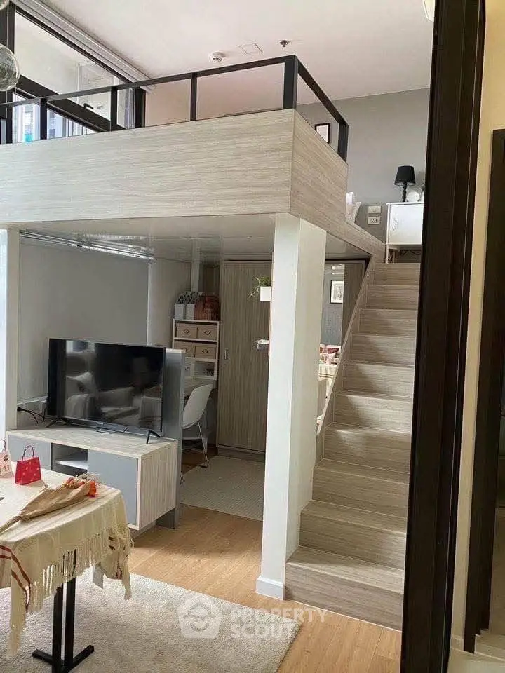 Modern loft apartment with stylish mezzanine and cozy living area