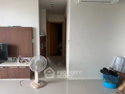 Modern living room with air conditioning and stylish wooden TV cabinet