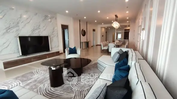 Luxurious modern living room with elegant decor and spacious seating area.