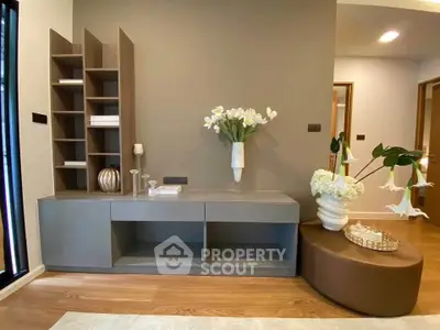 Stylish modern living room with elegant decor and wooden flooring