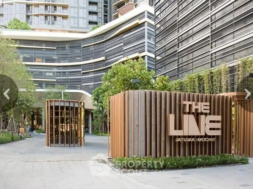 Modern urban building exterior with lush greenery at The Line Jatujak-Mochit.
