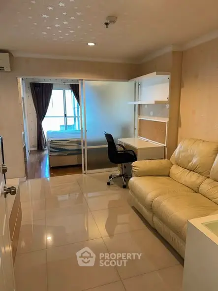 Modern studio apartment with open layout and cozy furnishings