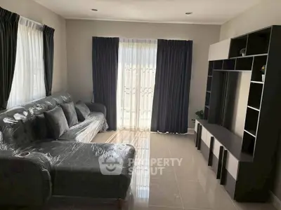 Modern living room with sleek furniture and natural light