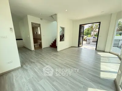 Spacious modern living room with open layout and natural light