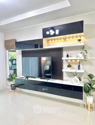 Modern living room with sleek TV unit and stylish decor