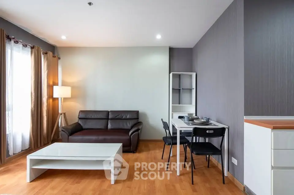 Modern living room with sleek furniture and natural light