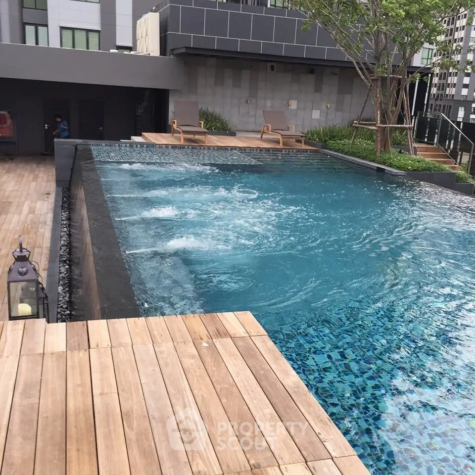 Luxurious rooftop infinity pool with modern design and city views, perfect for relaxation and leisure.