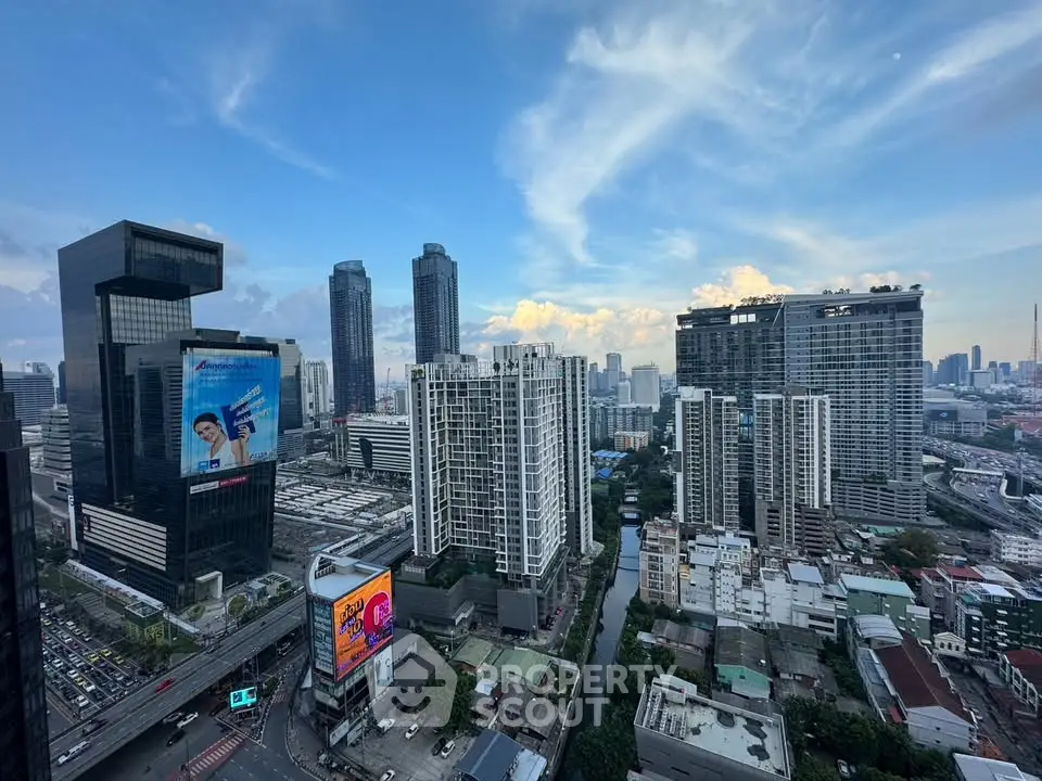 Stunning urban skyline view with modern high-rise buildings and clear blue sky.
