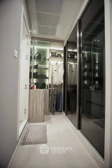 Luxurious walk-in closet with modern design and ample storage space