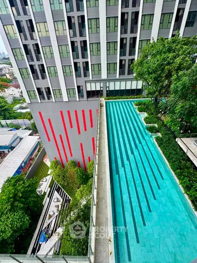 Stunning rooftop pool with city views in modern high-rise building