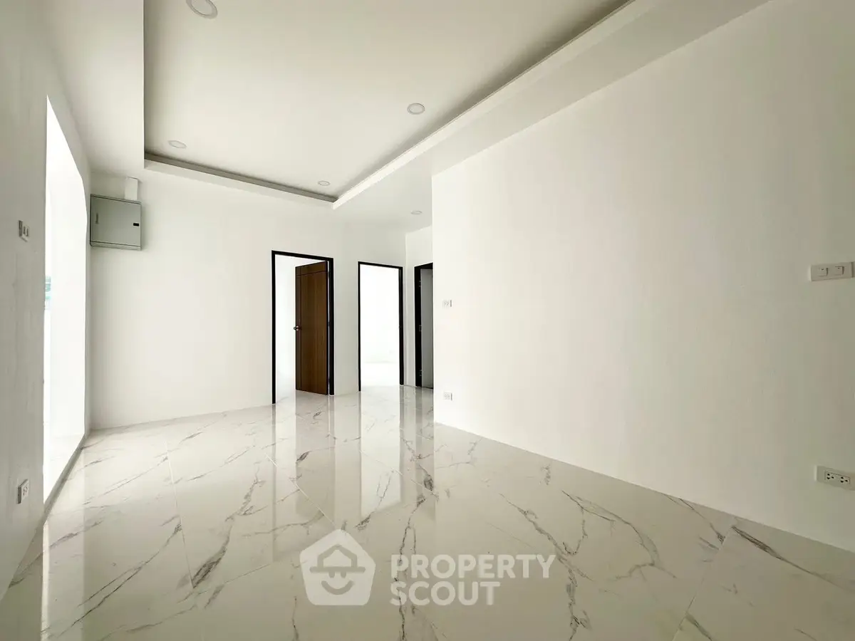 Spacious modern interior with marble flooring and minimalist design