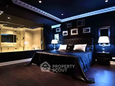 Luxurious bedroom with elegant black decor and ambient lighting