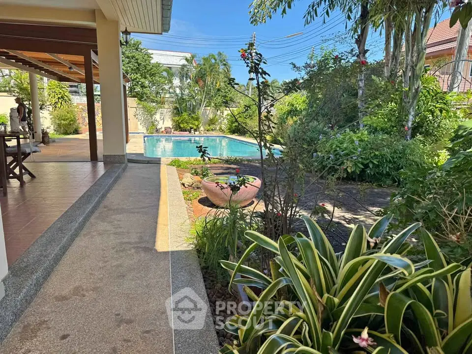 Stunning garden view with pool in a tropical paradise home