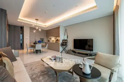 Luxurious open-plan living room with modern kitchen and elegant decor