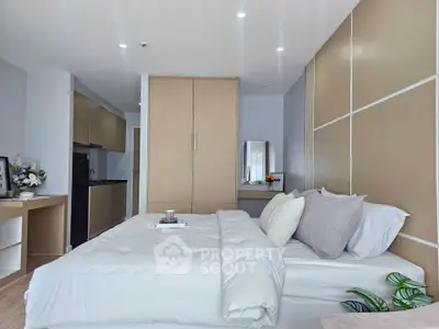 Modern bedroom with cozy bed and stylish decor in a contemporary apartment