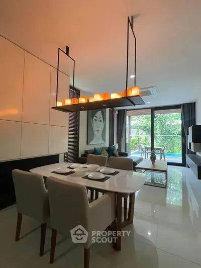 Modern living room with elegant dining area and stylish decor