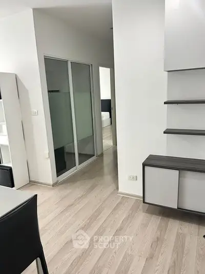 Modern apartment interior with sleek design and wooden flooring