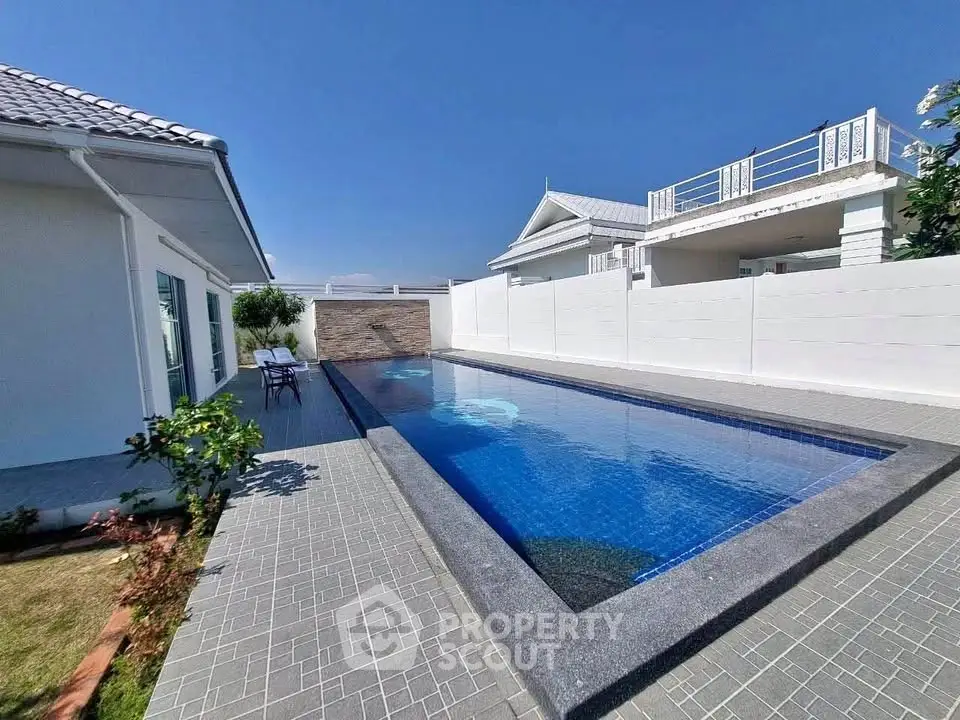 Luxurious private pool area with modern design and spacious surroundings