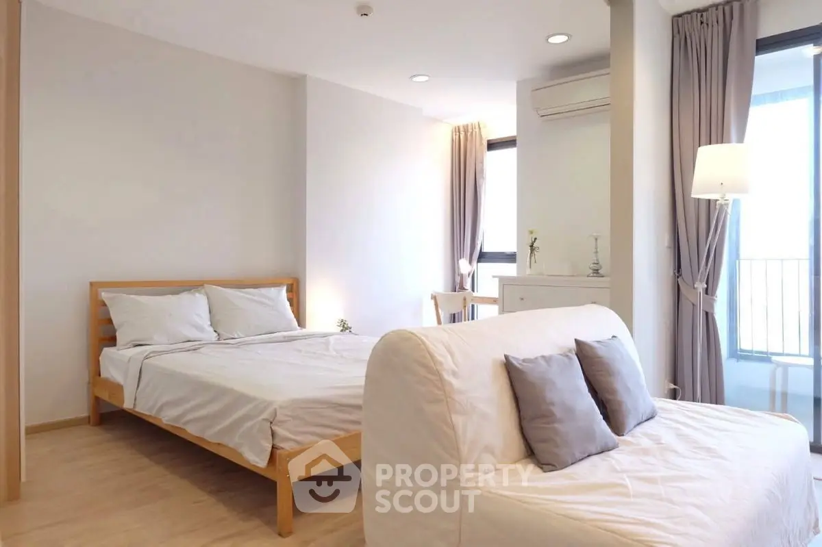 Bright and cozy bedroom with modern decor and natural light