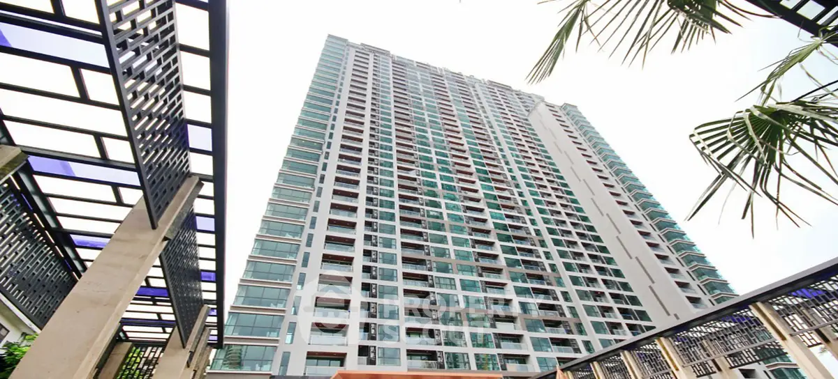 Stunning high-rise building with modern architecture and lush surroundings.