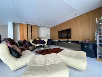 Luxurious living room with modern furniture and entertainment setup