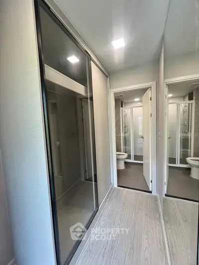 Modern bathroom with sleek design and glass shower enclosure