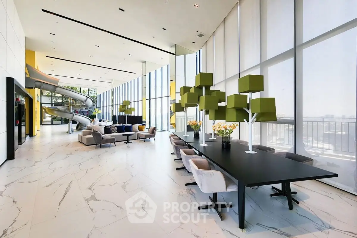 Luxurious modern living room with high ceilings and panoramic windows