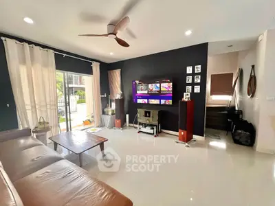 Spacious living room with modern decor and natural light