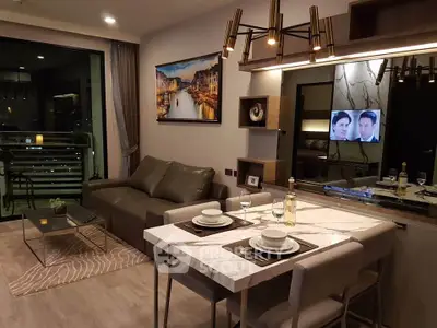 Modern living room with elegant dining area and city view balcony.