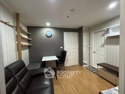 Modern living room with stylish furniture and wooden flooring