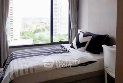 Cozy bedroom with city view and modern decor