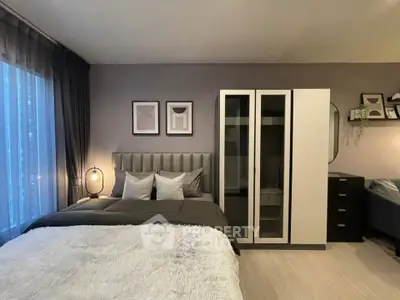 Modern bedroom with stylish decor and cozy ambiance