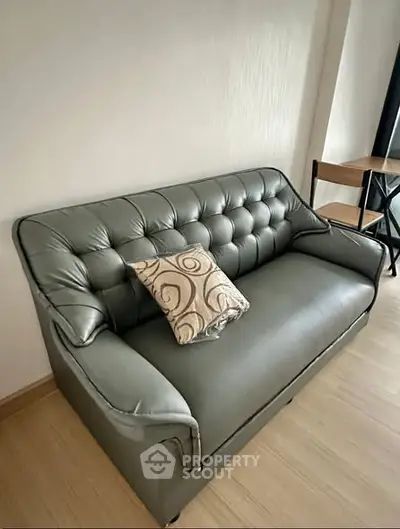 Stylish living room with elegant leather sofa and chic decor