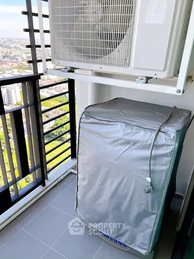 High-rise balcony with city view and air conditioning unit, perfect for urban living.