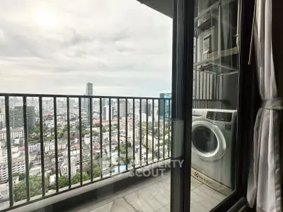 Stunning city view from modern balcony with washing machine