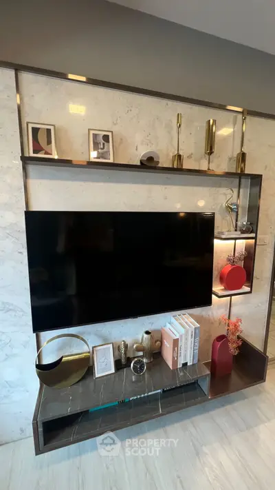 Modern living room with stylish TV wall unit and elegant decor