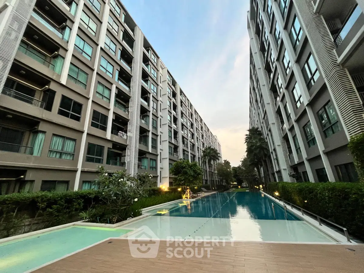 Luxurious condominium with stunning pool view and modern architecture
